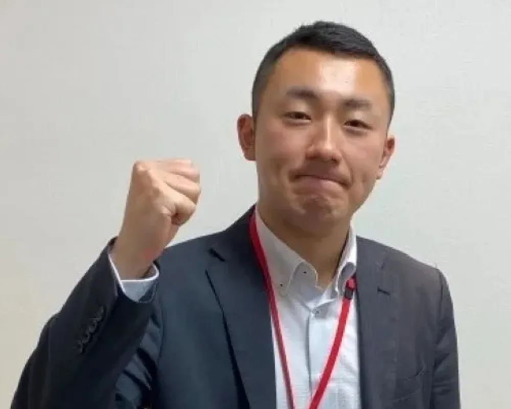 校舎長のガッツポーズ写真
